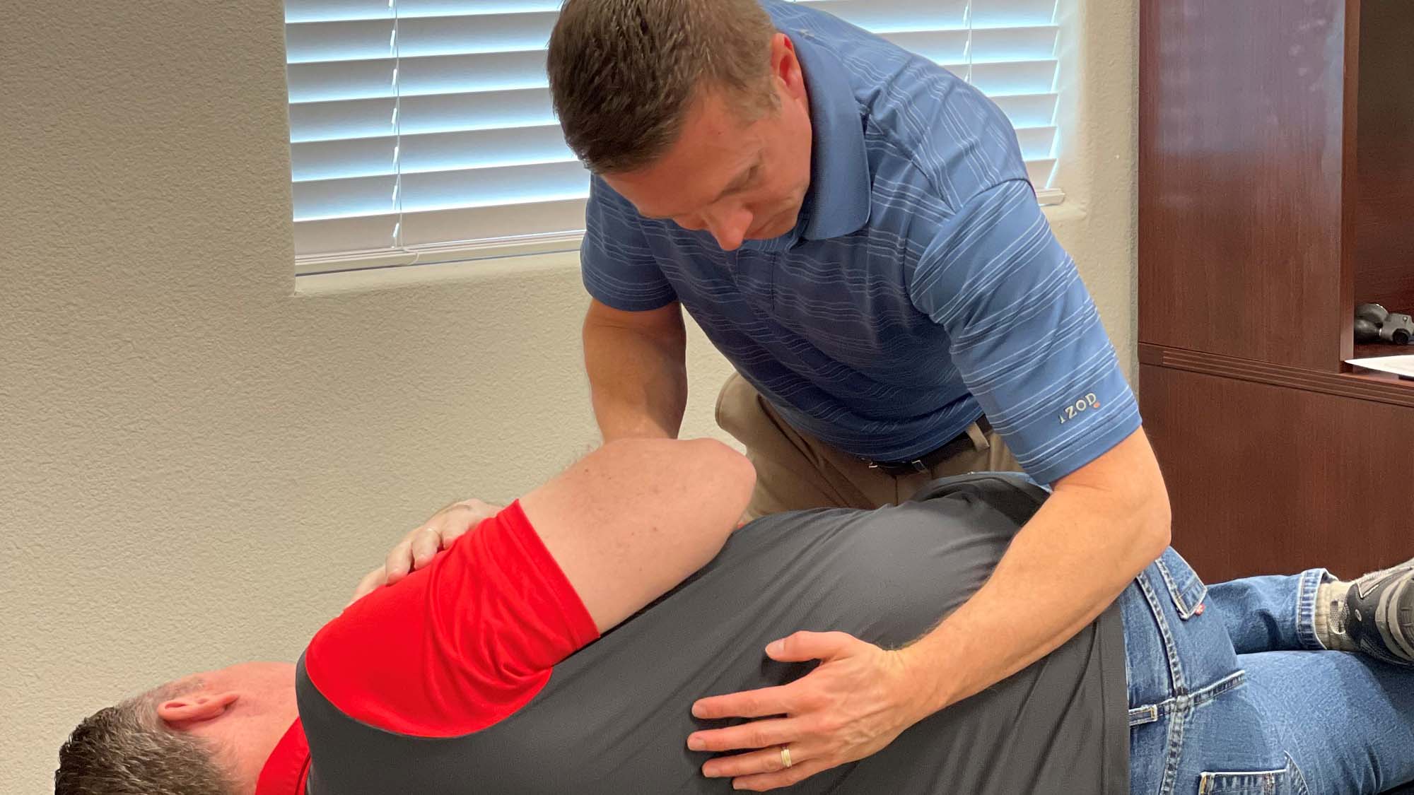 Chiropractor Flower Mound TX Dale Leonard Patient Adjustment